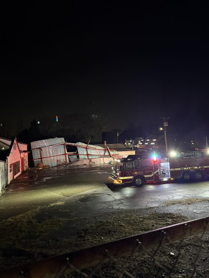 Roof damage to a building on RT 25 in Monroe