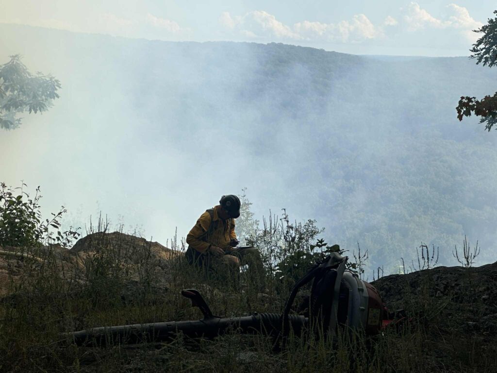 Washington CT Fire - A firefighter takes a break 